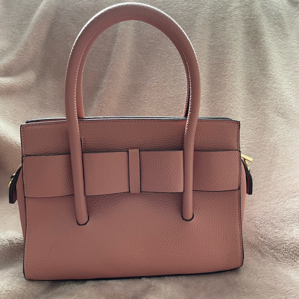 Adorable pink purse with bow detail